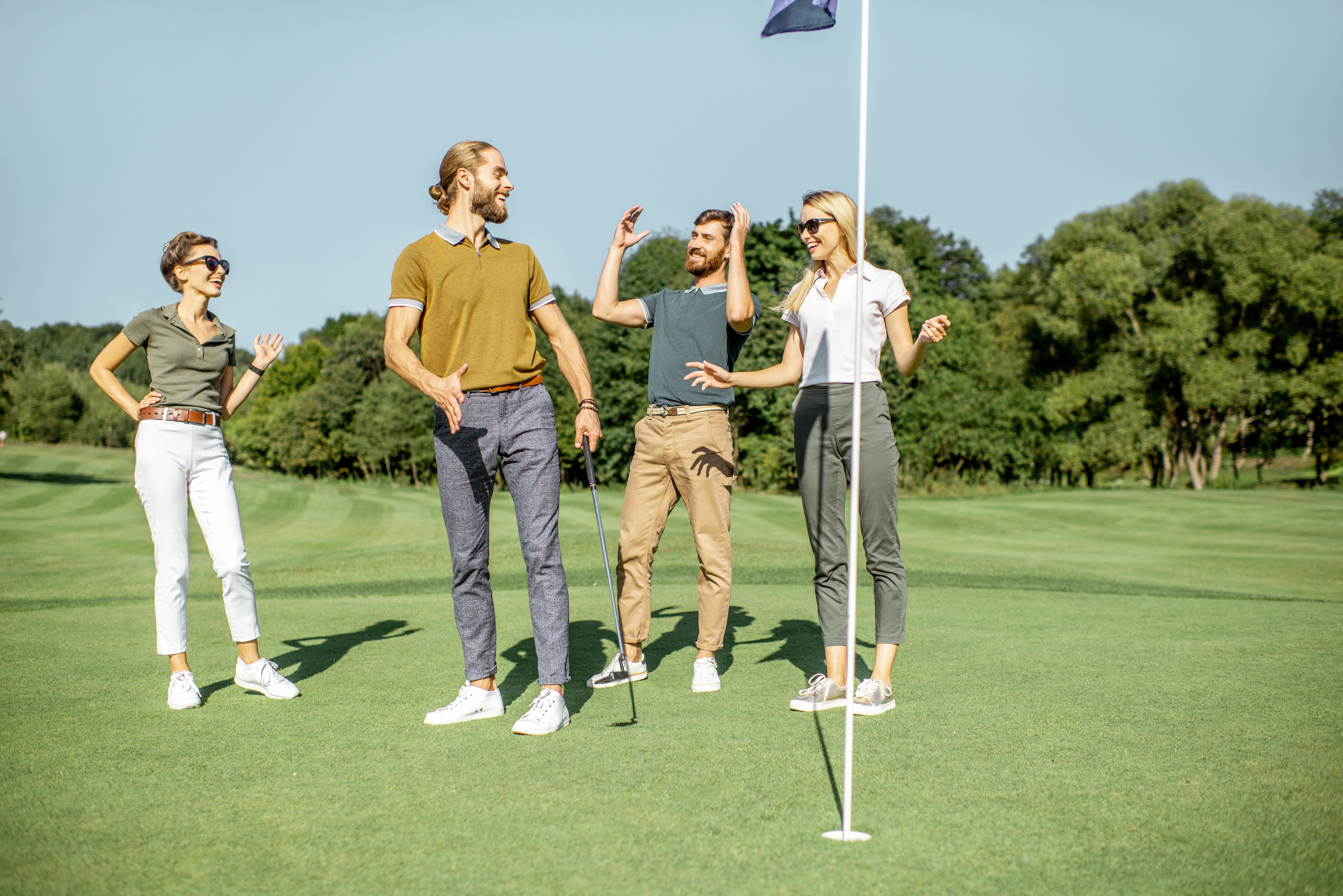 People Practising Golf Outdoors